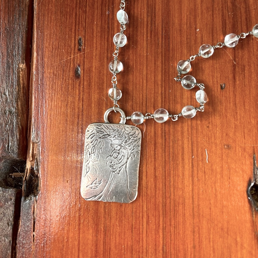 Gorgeous Jes Maharry mother and child necklace.